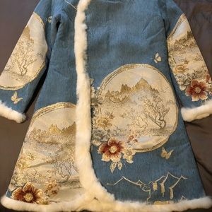 Liziqi women’s rabbit fur coat.